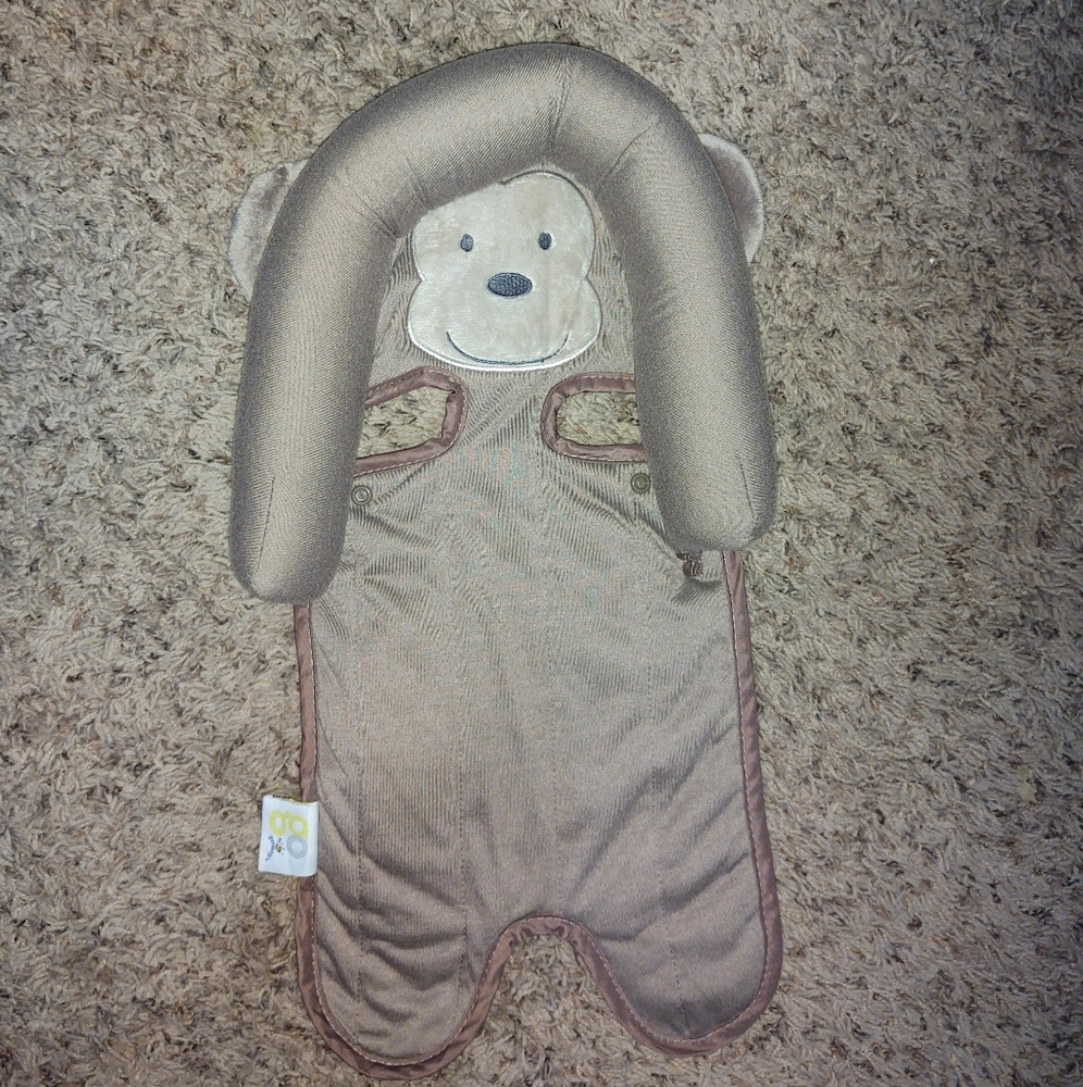 Monkey head rest for infant car seat